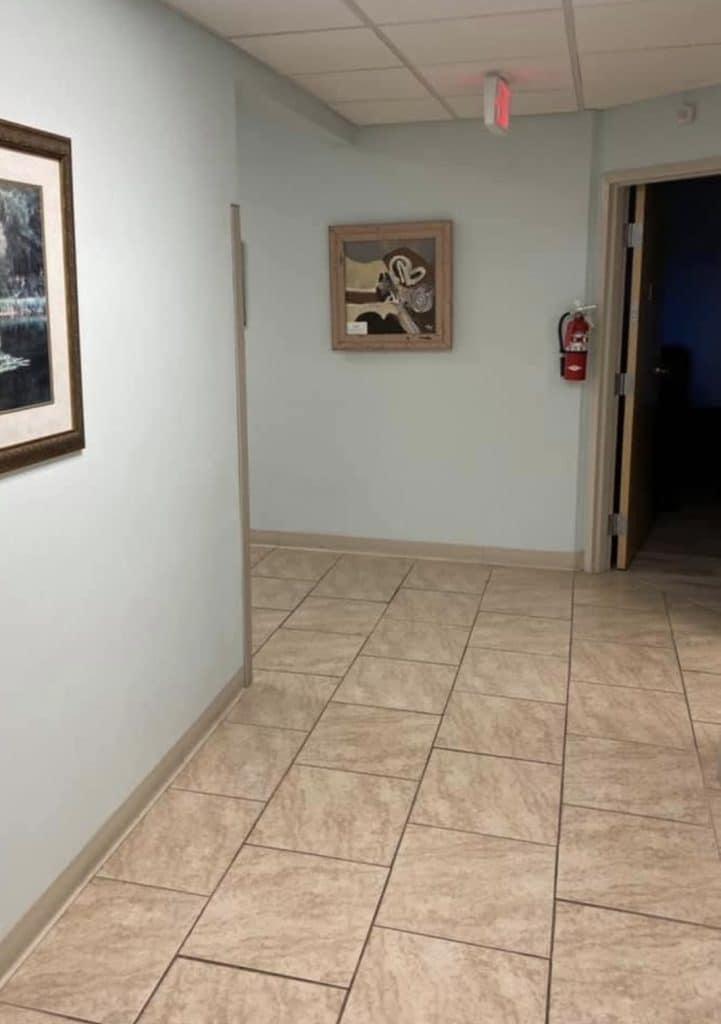 Artwork by Anne hanging in a public space